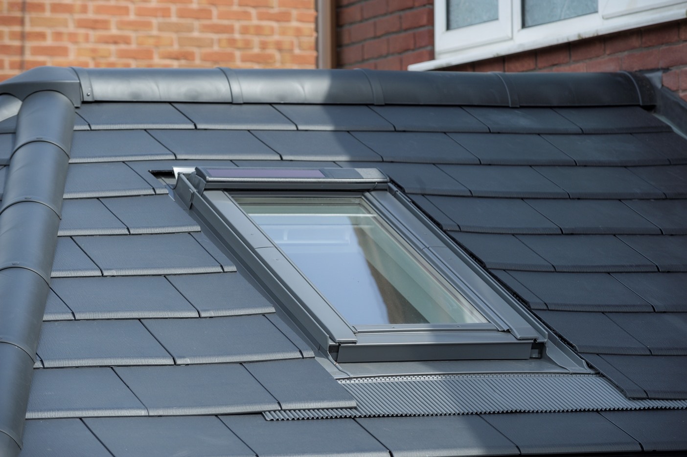 Replacement Tiled Conservatory Roofs dark grey with double glazed window