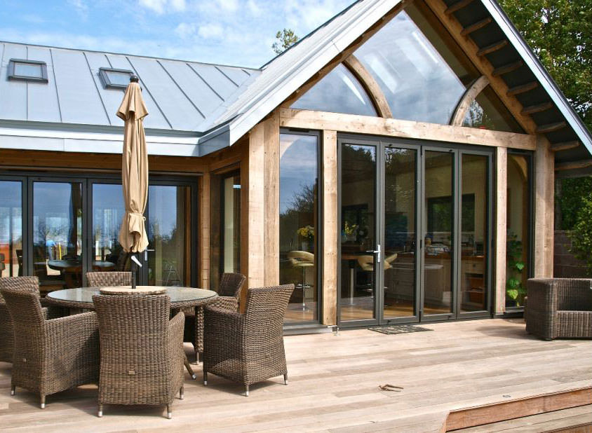 Wooden cabin with modern double glazed Aluminium Bifold Doors in Carmarthen