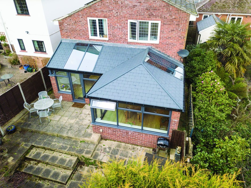 aerial shot of dark grey tiled conservatory roof on an L shaped conservatory